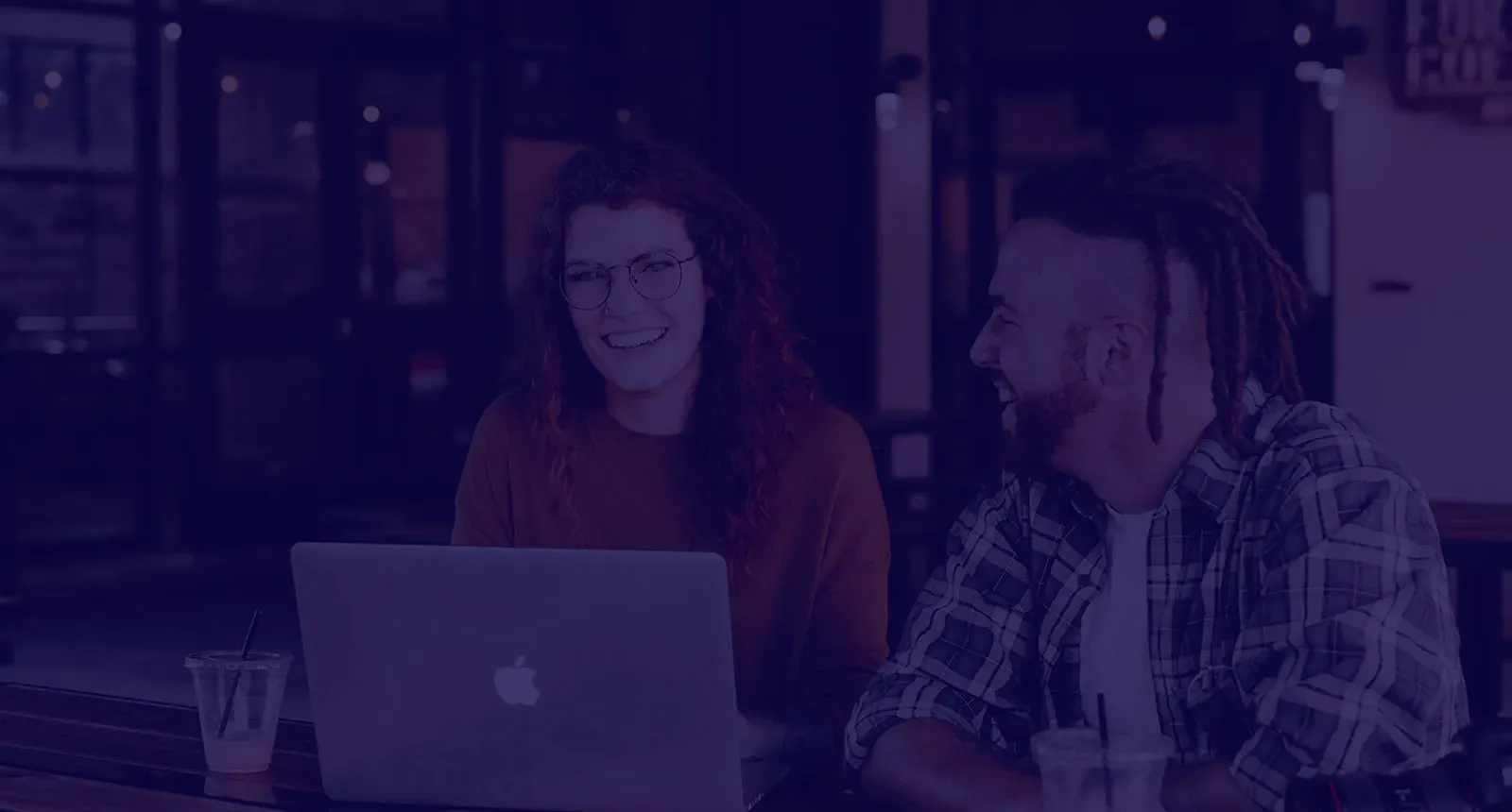 Business professionals collaborating on digital systems